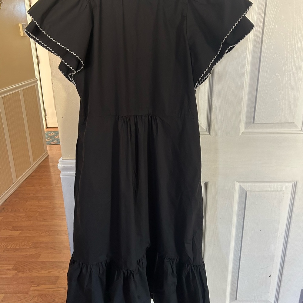 Tuckernuck Alice Dress is a black, elevated midi dress. - Picture 7 of 10